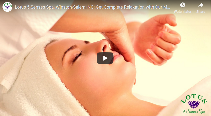 A lady having a facial massage in Winston-Salem